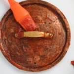 clean copper with tomato ketchup